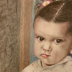 Close-up drawing of a baby wearing pig tails